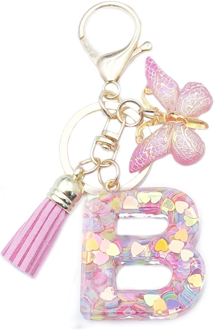 Keychain with letter 'B' charm, tassel, and butterfly